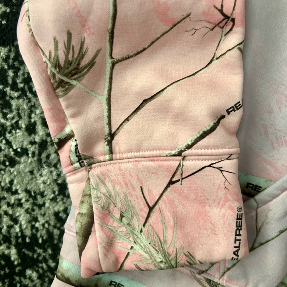Under Armour Women's Pullover Hoodie in a pink Realtree camouflage pattern. - Picture 4 of 7